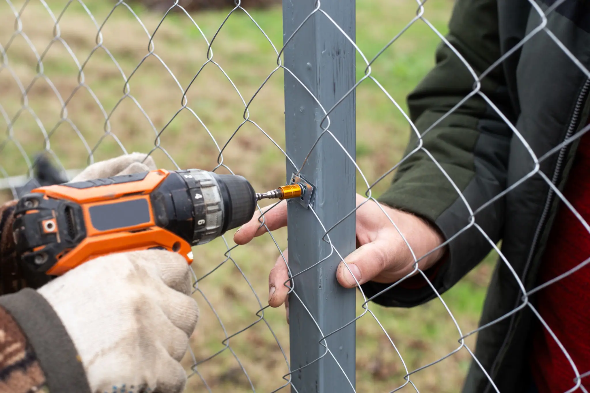 Chain-link fence installation using electric drill